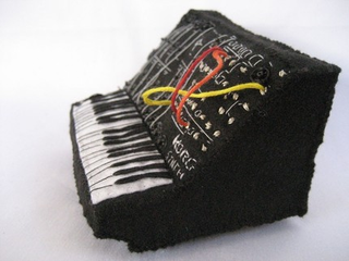 Illustration for article titled Miniature Synthesizer Replicas Cast in Felt Will Rock Your Tiny Mind